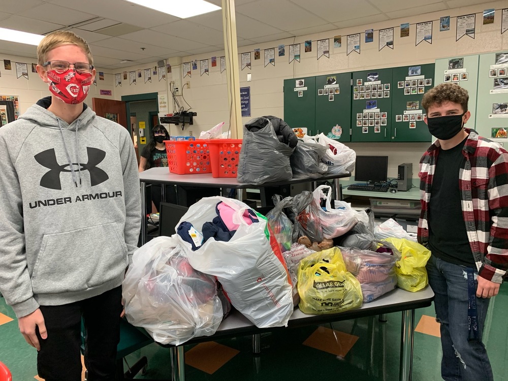 NHS members with clothing collected during the December clothing drive